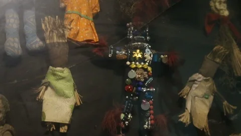 Voodoo Dolls tilt down display case Stock Footage 107624381