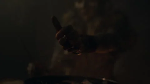 Voodoo Witch cuts her hand to draw blood Vidéo 259860840