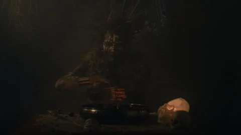 Voodoo Witch Doctor making a mixture Vídeo Stock 259868437