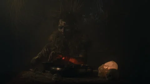 Voodoo Witch Doctor using a mixture 스톡 동영상 259869179