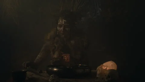 Voodoo witch performing a ritual 스톡 동영상 259866620