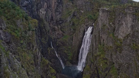 Voringfossen seen from sky framed by nature and steep valley walls Stock Footage 320245698