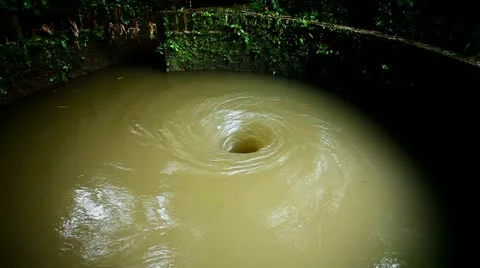 Water - Vortex - Whirlpool - Maelstrom Spinning underwater vortex against  white background Stock Photo