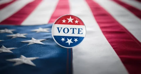Vote button pin, in the red white and blue of the United States America, pi.. Stock Footage 282467705