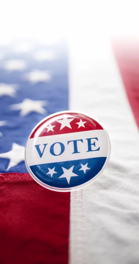 Vote button pin, in the red white and blue of the United States America, pi.. Stock Footage 282468049