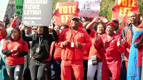 Vote EFF POV black dressed woman dancing holding placard Video stock 78615740