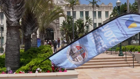 " Vote Here" banner marks election voting location at Beverly Hills City Hall Stock Footage 196849624