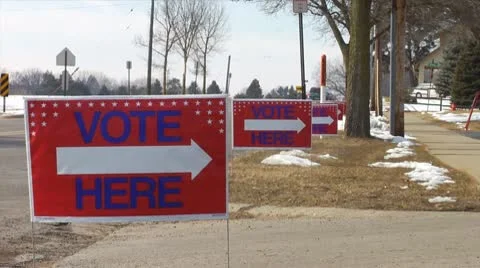 'Vote Here' Signs Stock Footage 10799755