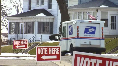 'Vote Here' with US Postal Truck Stock Footage 10799733