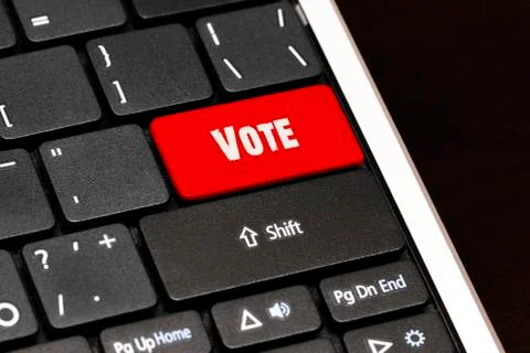 Vote on Red Enter Button on black keyboard Illustrazione stock