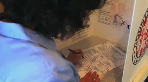 VOTER CASTING BALLOT Stock Footage