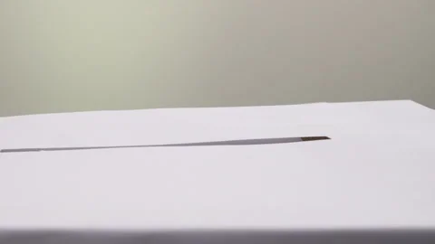 Voter Dropping Off Ballot in Polling Box for 2020 Election 스톡 동영상 138784282