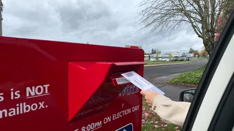 Voter Drops Ballot Off At Mail In Location Stock Footage 290133452