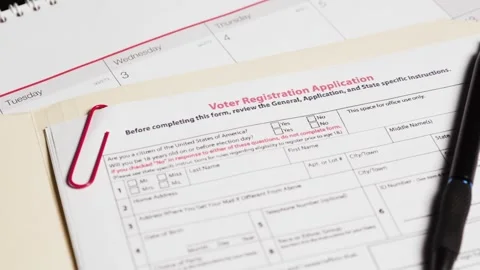 Voter registration application form on turntable Stock Footage 260082762