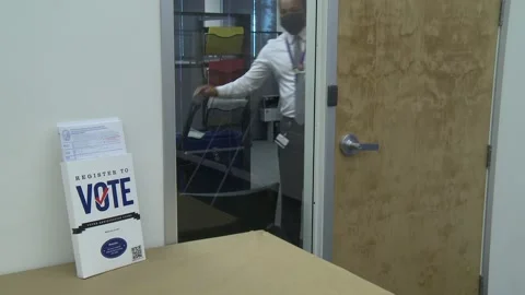 VOTER REGISTRATION OFFICE Stock Footage 141551920