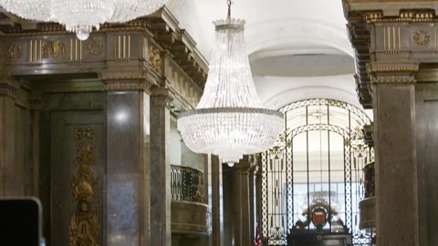 Voters queue beneath the chandeliers in the hall of Australia House Video stock 345299001