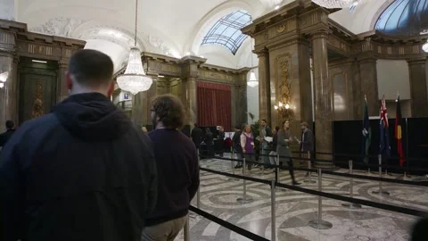 Voters queue inside the hall at Australia House in London Video stock 345298997