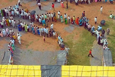 Voters standing in queue to cast vote Bombay Mumbai ; Maharashtra ; India ... Stock Photos