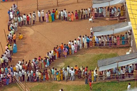 Voters standing in queue to cast vote Bombay Mumbai ; Maharashtra ; India ... Stock Photos