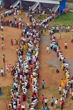 Voters standing in queue to cast vote Bombay Mumbai ; Maharashtra ; India ... Stock Photos