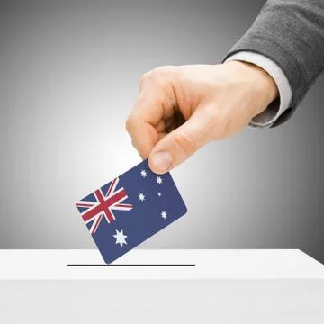 Voting concept - Male inserting flag into ballot box - Australia Stock Illustration