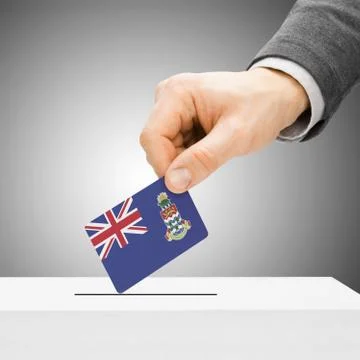 Voting concept - Male inserting flag into ballot box - Cayman Islands Stock Illustration