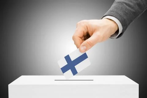 Voting concept - male inserting flag into ballot box - finland 스톡 사진
