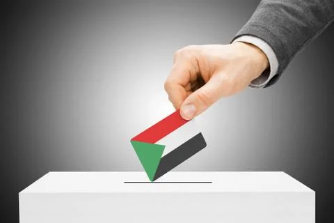 Voting concept - male inserting flag into ballot box - sudan 스톡 사진