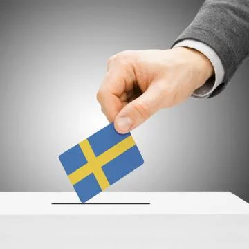 Voting concept - Male inserting flag into ballot box - Sweden 写真素材