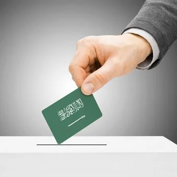  Voting concept - Male inserting flag into ballot box - Saudi Arabia Votin... 스톡 사진