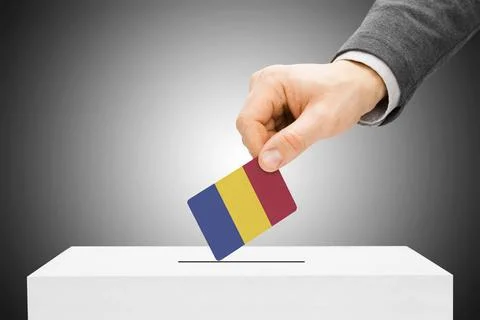 Voting concept - Male inserting flag into ballot box - Romania Voting conc... Stock Photos