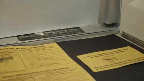 VOTING INSTRUCTIONS AT BOOTH: 2020 ELECTION - VOTE - TILT UP Video stock 141549183