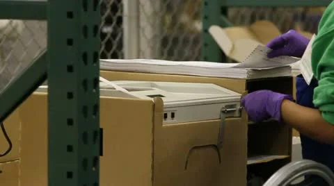 Voting machine being fed 2 Stock-Footage 12487768