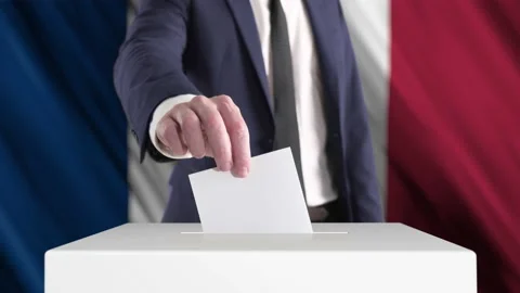 Voting. Man Putting a Ballot into a Voting Box with French Flag on Background. Stock Footage 173425256