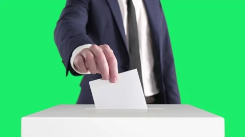 Voting. Man Putting a Ballot into a Voting Box with Chroma Key on Background. Stock Footage 198172648