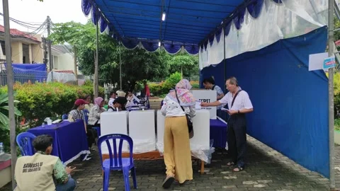 Voting process in Indonesia on general election day Stock Footage 264953104