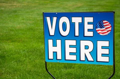 Voting sign on grass Stock Photos