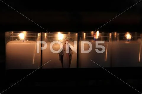 Votive candles in a church Stock Photos