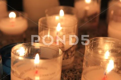 Votive candles in a church Stock Photos