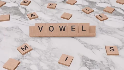 VOWEL word written on scrabble Stock Footage 256875239