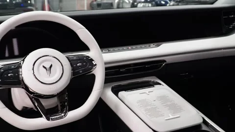 Voyah Free elegant E-SUV white interior, steering wheel, dashboard. Stock Footage 328975143