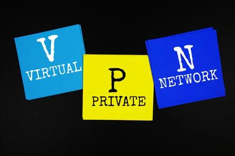 VPN - Virtual Private Network acronym text on sticky note on black background Stock Photos