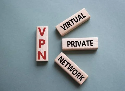 VPN - Virtual Private Network. Wooden cubes with word VPN. Beautiful grey g.. Stock Photos
