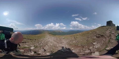 Vr 360 Backpacker walking alone in mountains Stock Footage 94681966