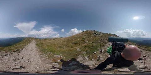 Vr 360 Backpacker walking alone in mountains 4pt. Stock Footage 94716474