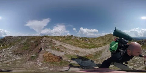 Vr 360 Backpacker walking alone in mountains 5pt. Stock Footage 94717086