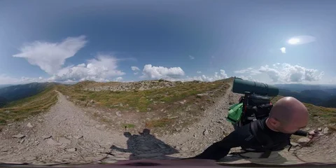 Vr 360 Backpacker walking alone in mountains 6pt. Stock Footage 94717169