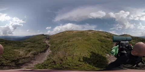 Vr 360 Backpacker walking alone in mountains 11pt. Stock Footage 94717852