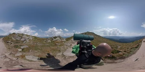 Vr 360 Backpacker walking alone in mountains 3pt. Stock Footage 94717908