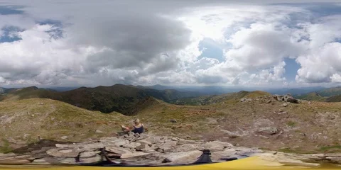 Vr 360 Clouds Timelapse. Tourist traveler in mountains Stock Footage 94292824